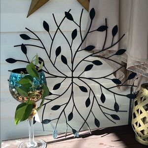 Metal wall decor in a leaf pattern PLEASE SEND OFFERS